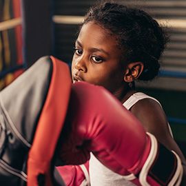 Kids are taught boxing at Elite Fitness Classes in Columbia, Ellicott City, Baltimore Maryland
