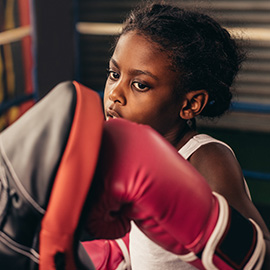 Kids are taught boxing at Elite Fitness Classes in Columbia, Ellicott City, Baltimore Maryland